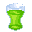 Green drink in a curved glass..
